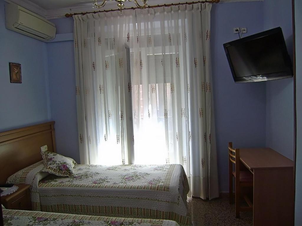Hostal Miguel Angel Madri Quarto foto